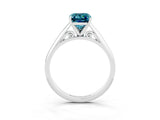 Platinum Emerald Cut Blue Topaz Solitaire Engagement Ring with Cathedral Setting and Four-Prong Mount_9