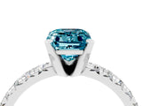 Platinum Emerald Cut Blue Topaz Solitaire Pavé Engagement Ring with Round Band and Prong Setting_88