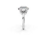 Platinum Emerald Cut Diamond Three-Stone Halo Ring with Prong Setting and Pavé Accents_15