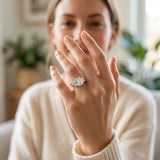 Platinum Emerald Cut Diamond Three-Stone Ring with Channel Set Band and Four-Prong Setting_66