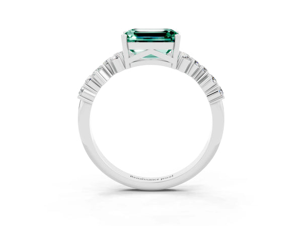 Platinum Emerald Cut Green Sapphire Scattered Round Accent Ring with Prong Setting