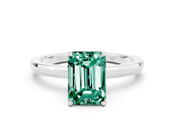 Platinum Emerald Cut Green Sapphire Solitaire Ring with Thin Band and Prong Setting
