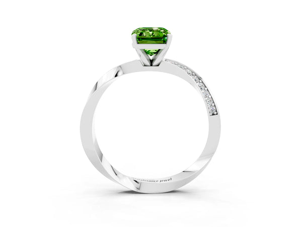 Platinum Emerald Cut Peridot Engagement Ring with Side Stone Accents and Four-Prong Setting