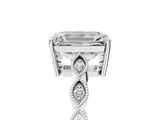Platinum Emerald Cut Solitaire Diamond Ring with Infinity Twist Band and Four-Prong Setting_18