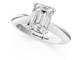 Platinum Emerald Cut Solitaire Engagement Ring with Tapered Band and Four-Prong Setting 1