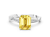 Platinum Emerald Cut Yellow Sapphire Engagement Ring with Side Stone Accents and Four-Prong Setting_12
