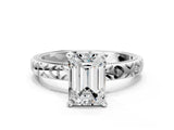 Platinum Emerald Solitaire Diamond Engagement Ring with XO Engraved Band and Four-Prong Setting