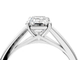 Platinum Emerald Solitaire Engagement Ring with Four-Prong Setting and Classic Band