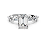 Platinum Emerald Solitaire Twisted Band with Prong Setting