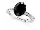 Platinum Fancy Black Oval Cut Diamond Engagement Ring with Side Stone Accents and Four-Prong Setting_13