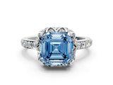 Platinum Fancy Blue Asscher Cut Diamond Scalloped Halo Engagement Ring with Round Shared Prong Band