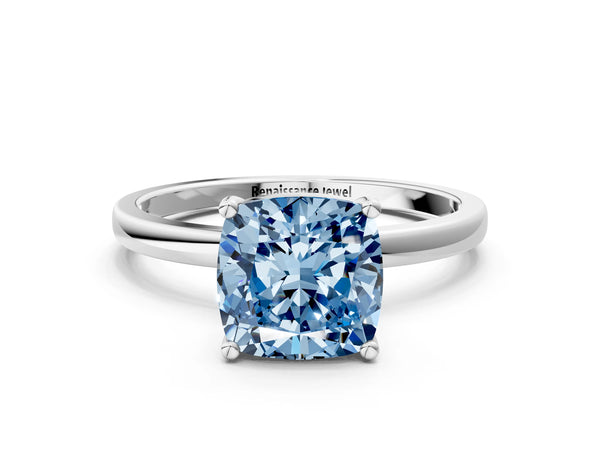 Platinum Fancy Blue Cushion Cut Diamond Solitaire Ring with Classic Band and Four-Prong Setting