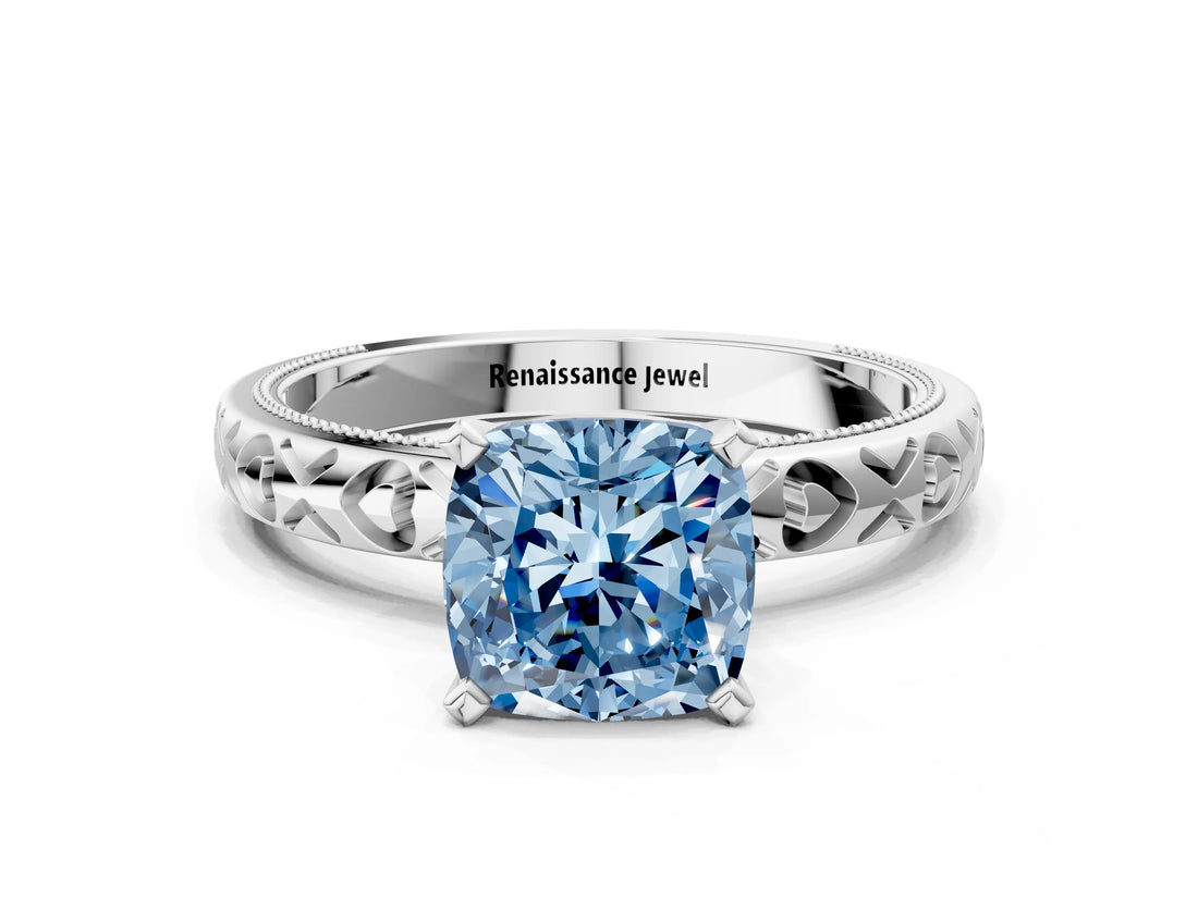 Platinum Fancy Blue Cushion  Solitaire Diamond Engagement Ring with XO Engraved Band and Four-Prong Setting