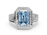 Platinum Fancy Blue Emerald Cut Diamond Halo Ring with Split Shank and Bezel Accents and Prong Setting_36