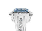 Platinum Fancy Blue Emerald Cut Diamond Halo Ring with Split Shank and Bezel Accents and Prong Setting_41