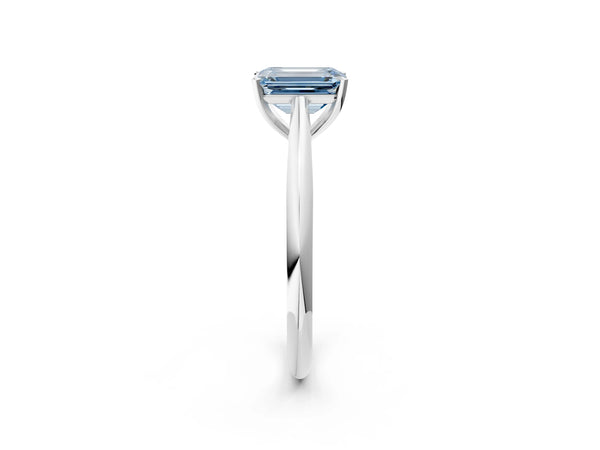 Platinum Fancy Blue Emerald Cut Diamond Solitaire Engagement Ring with Cathedral Setting and Four-Prong Mount