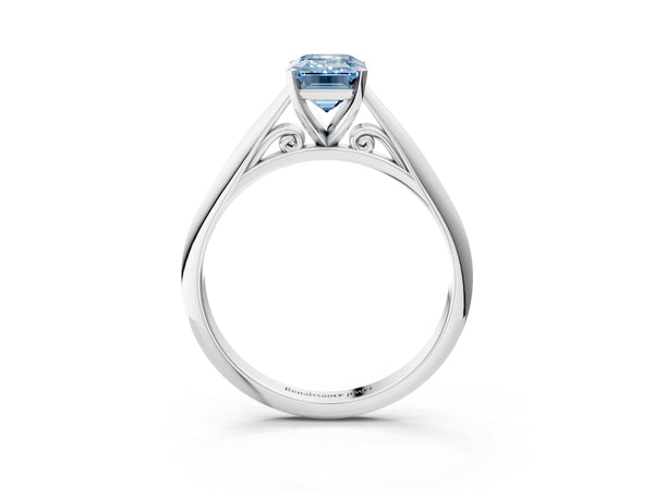 Platinum Fancy Blue Emerald Cut Diamond Solitaire Engagement Ring with Cathedral Setting and Four-Prong Mount