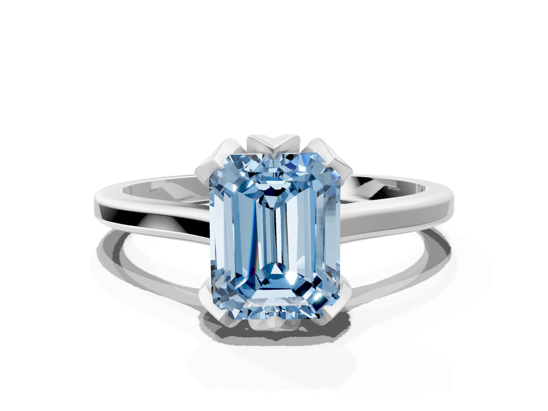Platinum Fancy Blue Emerald Cut Diamond Solitaire Ring with Flower Prong Setting and Classic Band