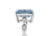 Platinum Fancy Blue Emerald Cut Solitaire Diamond Ring with Infinity Twist Band and Four-Prong Setting_17