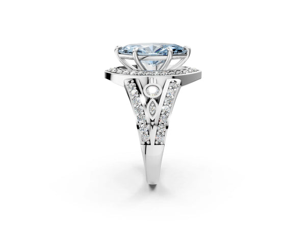 Platinum Fancy Blue Marquise Cut Diamond Halo Ring with Split Shank and Bezel Accents and Four-Prong Setting
