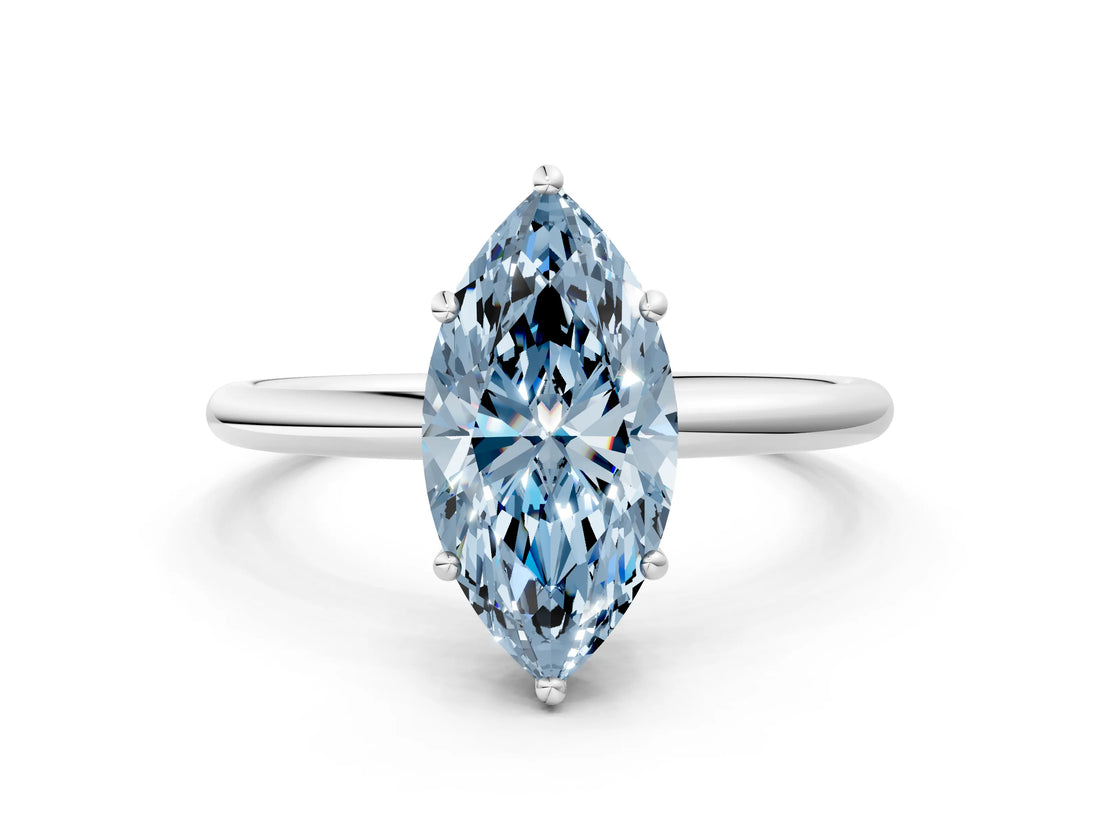 Platinum Fancy Blue Marquise  Solitaire Diamond Ring with a Classic Band and Four-Prong Setting