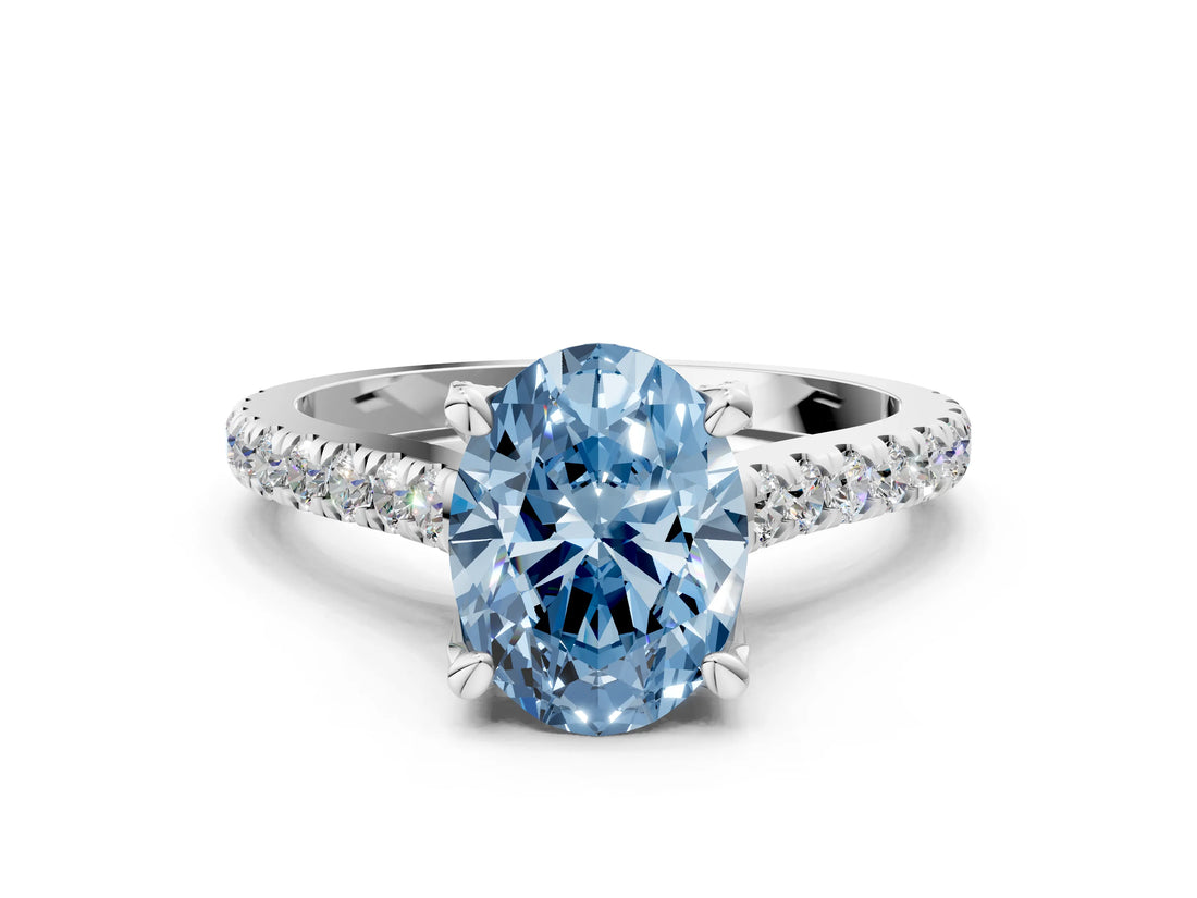 Platinum Fancy Blue Oval  Brilliant Diamond Solitaire with Pavé Band and Four-Prong Setting