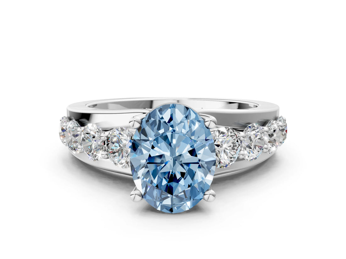 Platinum Fancy Blue Oval  Brilliant Solitaire with Side Stones on a Pave Band and Four-Prong Setting_12