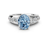 Platinum Fancy Blue Oval  Brilliant Solitaire with Side Stones on a Pave Band and Four-Prong Setting_12
