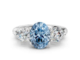 Platinum Fancy Blue Oval Cut Diamond Three-Stone Ring with Prong Setting and Pavé Band_12