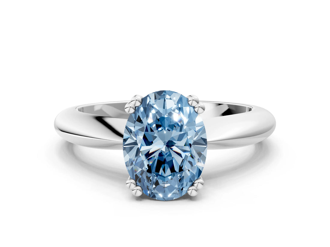 Platinum Fancy Blue Oval  Cut Solitaire Engagement Ring with Tapered Band and Four-Prong Setting