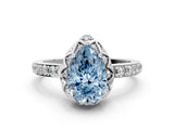 Platinum Fancy Blue Pear Cut Diamond Scalloped Halo Engagement Ring with Round Shared Prong Band