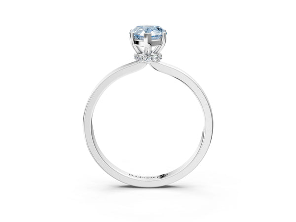 Platinum Fancy Blue Pear Cut Diamond Solitaire Ring with Classic Band and Four-Prong Setting