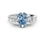Platinum Fancy Blue Pear Cut Diamond Three-Stone Engagement Ring with Prong Setting and Pavé Band_84