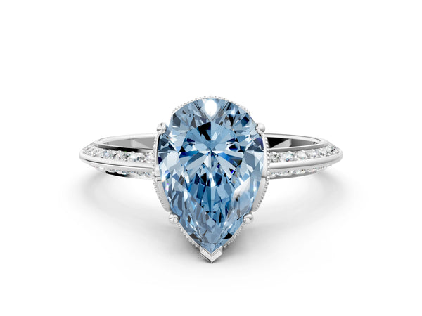 Platinum Fancy Blue Pear Cut Solitaire Split Shank Pave Diamond Engagement Ring with Four-Prong Setting
