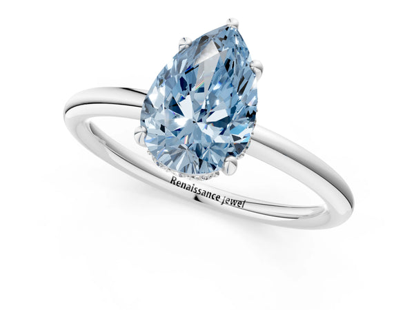 Platinum Fancy Blue Pear  Solitaire Diamond Ring with a Classic Band and Four-Prong Setting