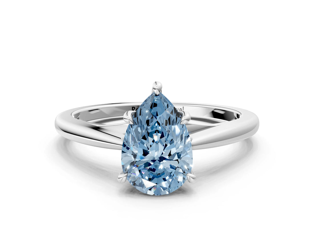 Platinum Fancy Blue Pear  Solitaire Engagement Ring with Four-Prong Setting and Classic Band
