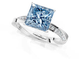 Platinum Fancy Blue Princess Cut Diamond Engagement Ring with Side Stone Accents and Four-Prong Setting_1