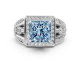 Platinum Fancy Blue Princess Cut Diamond Halo Ring with Split Shank and Bezel Accents and Four-Prong Setting_6