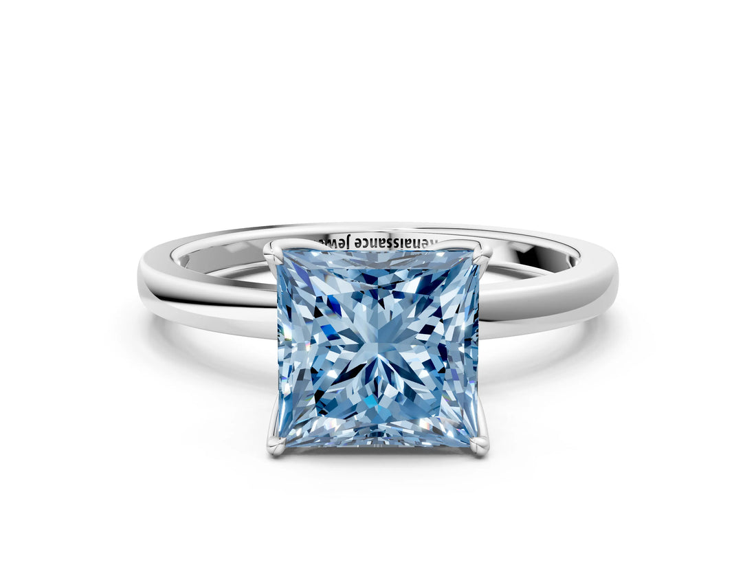 Platinum Fancy Blue Princess Cut Diamond Solitaire Ring with Thin Band and Prong Setting