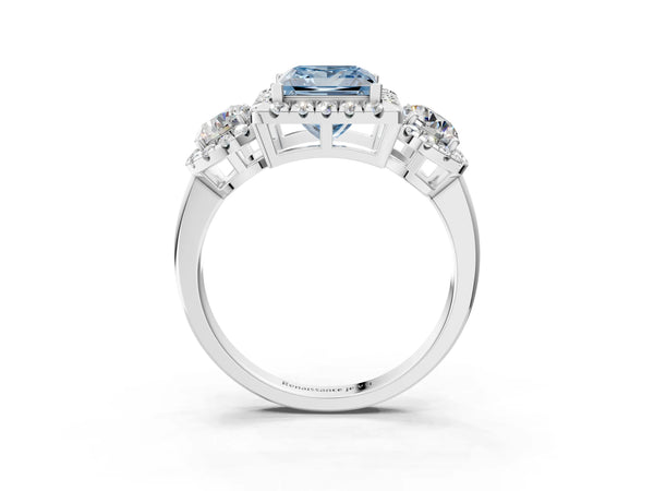Platinum Fancy Blue Princess Cut Diamond Three-Stone Halo Ring with Prong Setting and Pavé Accents