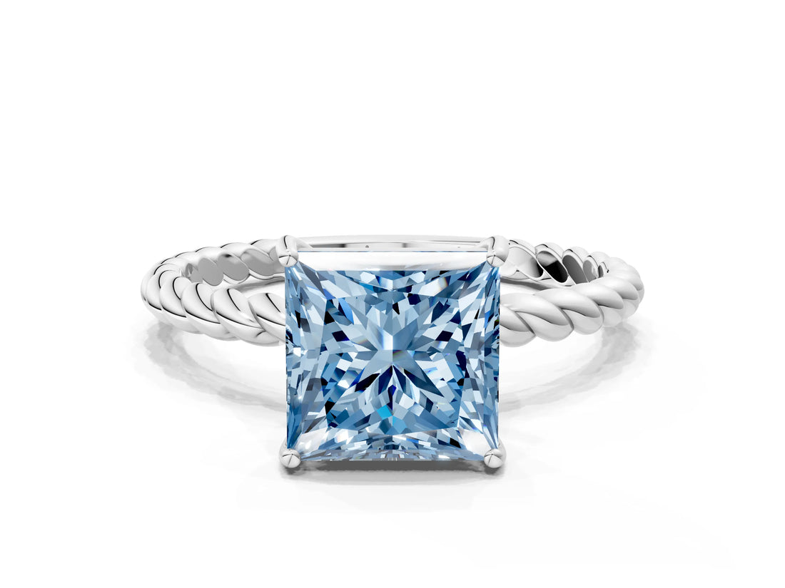 Platinum Fancy Blue Princess  Solitaire Twist Band Ring with Four-Prong Setting