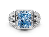 Platinum Fancy Blue Radiant Cut Diamond Halo Ring with Split Shank and Bezel Accents and Four-Prong Setting_6