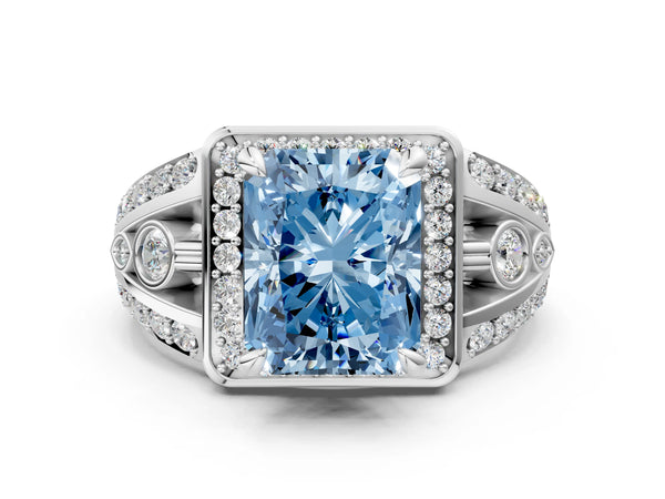 Platinum Fancy Blue Radiant Cut Diamond Halo Ring with Split Shank and Bezel Accents and Four-Prong Setting
