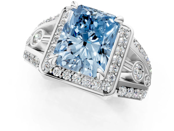 Platinum Fancy Blue Radiant Cut Diamond Halo Ring with Split Shank and Bezel Accents and Four-Prong Setting