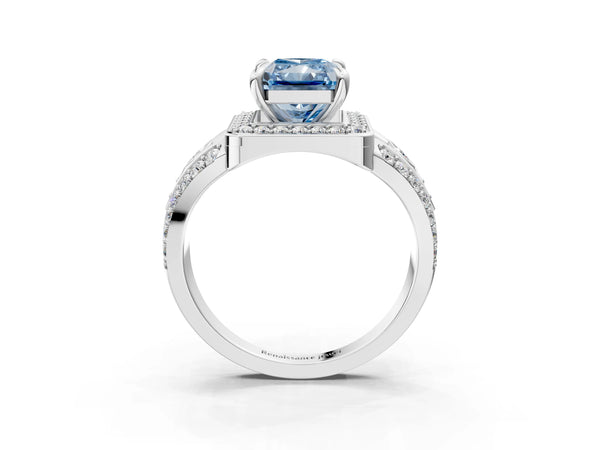 Platinum Fancy Blue Radiant Cut Diamond Halo Ring with Split Shank and Bezel Accents and Four-Prong Setting