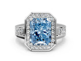 Platinum Fancy Blue Radiant Cut Diamond Halo Ring with Split Shank and Bezel Accents and Prong Setting_12