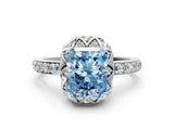 Platinum Fancy Blue Radiant Cut Diamond Scalloped Halo Engagement Ring with Round Shared Prong Band