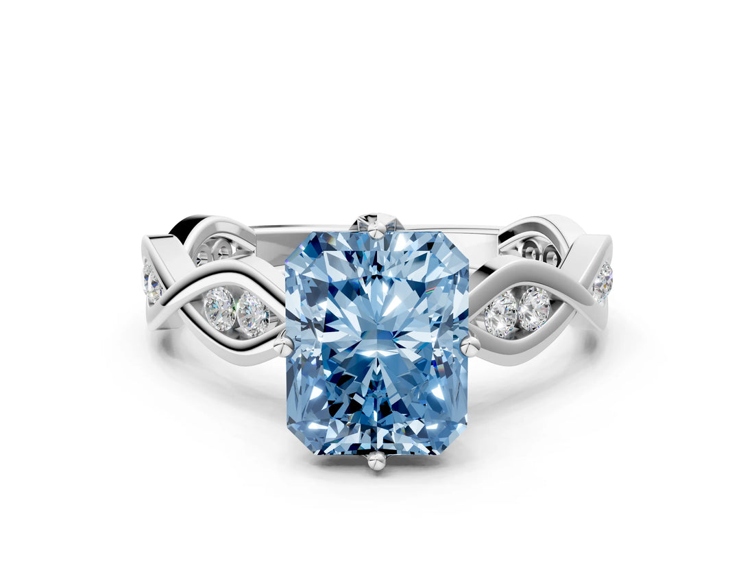 Platinum Fancy Blue Radiant  Solitaire Twist Band with Leaf Prong Setting