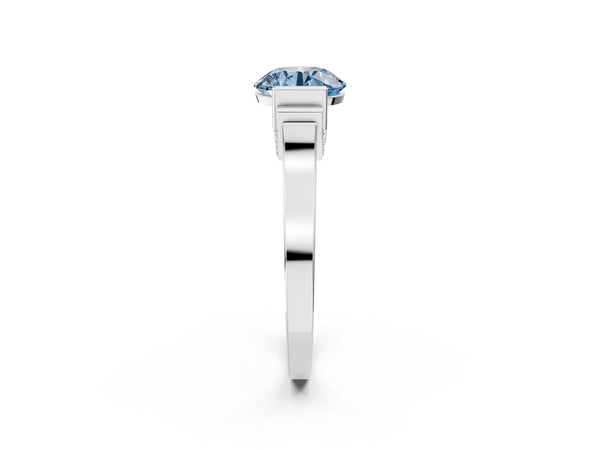 Platinum Fancy Blue Round Cut Brilliant Solitaire Diamond Ring with Channel Set Band and Bar Prong Setting
