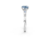 Platinum Fancy Blue Round  Cut Diamond Ring with Baguette Side Stones, Channel Set Band, and Four-Prong Setting_26